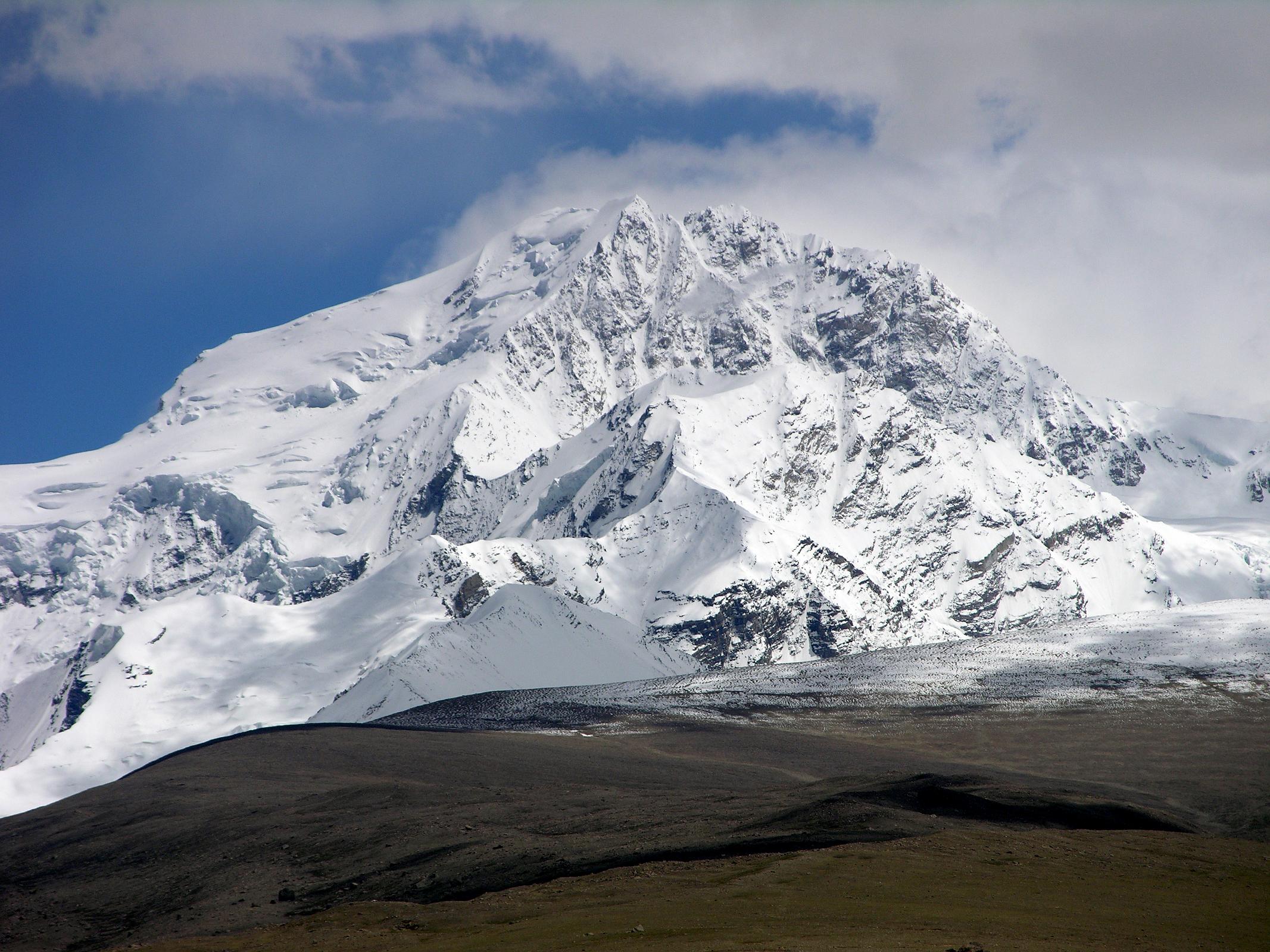 Shishapangma North 01 08 Shishapangma From North Base Camp Here�s a closer view of the 14th highest mountain in the world, Shishapangma, as it poked briefly out of the monsoon clouds.